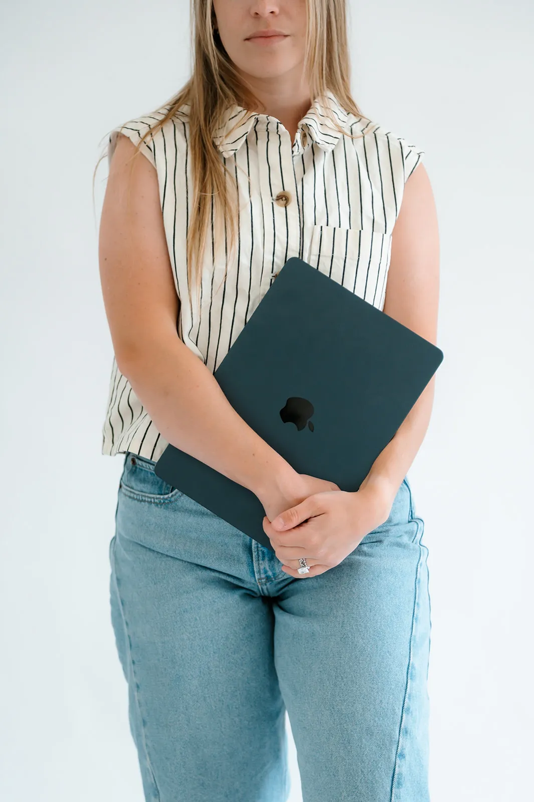 Brooke Kennison holding a laptop